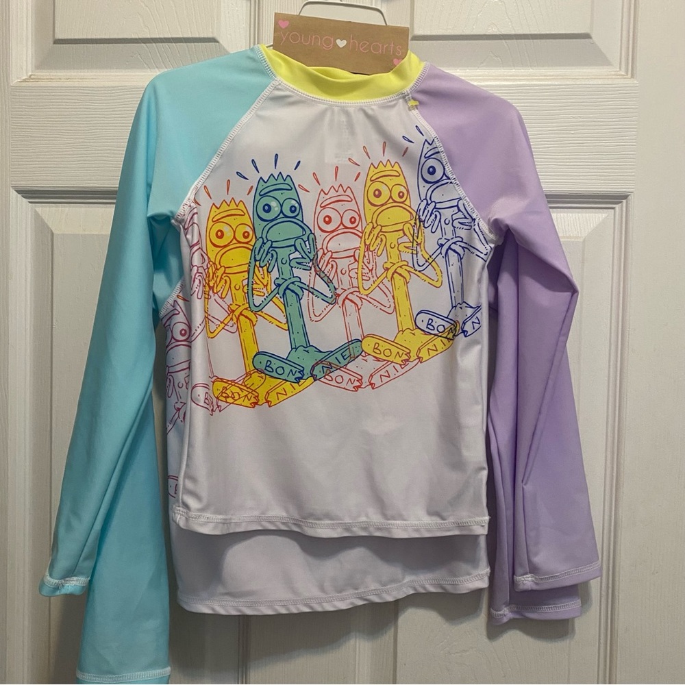2 Tops Rashguard girls  size 5/6 used in excellent condition.